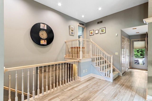 4367 Tavistock Cir, Powell, OH 43065 - stairway featuring wood finished floors, recessed lighting, and baseboards