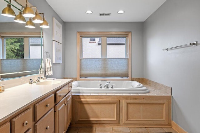 4367 Tavistock Cir, Powell, OH 43065 - full bath with a garden tub, vanity, and tile patterned flooring