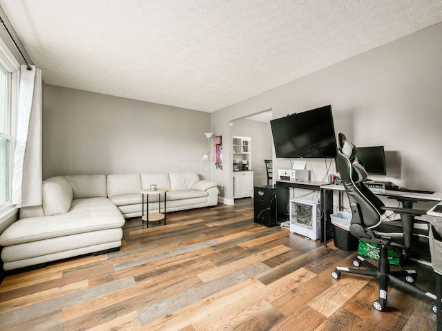 7121 Briarcliff Rd, Reynoldsburg, OH 43068 - office area with wood finished floors and a textured ceiling