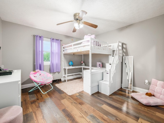 7121 Briarcliff Rd, Reynoldsburg, OH 43068 - bedroom with wood finished floors, baseboards, and ceiling fan