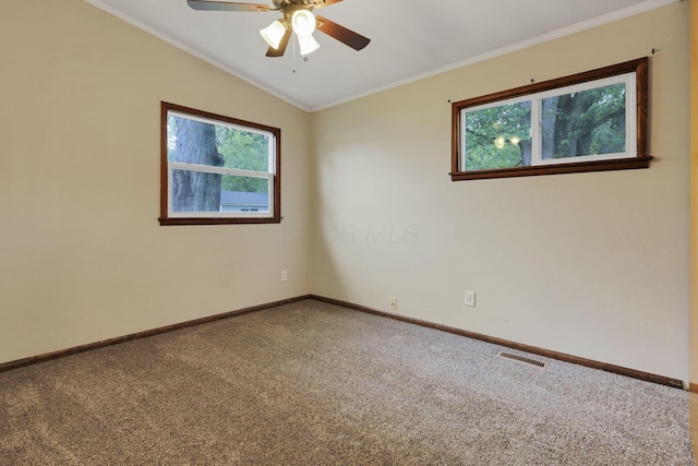 269 N 30th St, Newark, OH 43055 - empty room with carpet floors, a ceiling fan, baseboards, vaulted ceiling, and crown molding