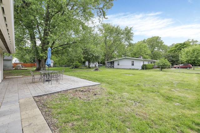 269 N 30th St, Newark, OH 43055 - view of yard featuring a patio and view of scattered trees