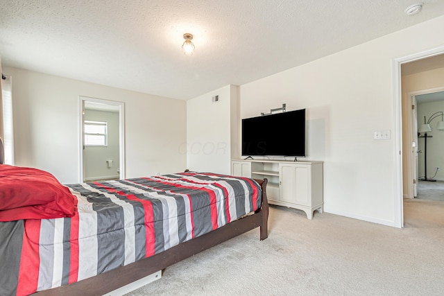 42 Carolyn Ln, Delaware, OH 43015 - bedroom featuring carpet, a textured ceiling, and baseboards