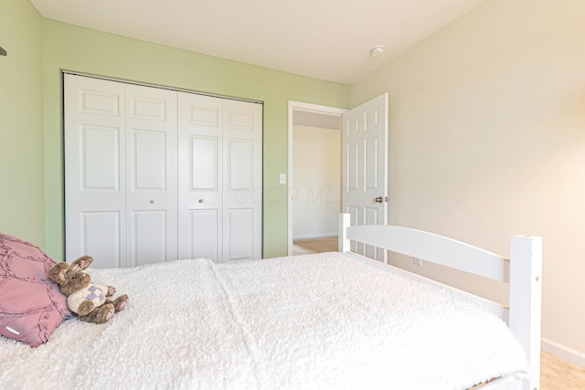 42 Carolyn Ln, Delaware, OH 43015 - carpeted bedroom with a closet and baseboards