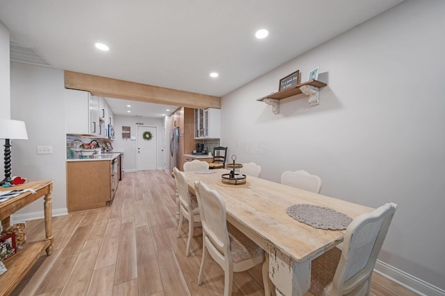2348 Willowside Ln, Grove City, OH 43123 - dining area featuring light wood-style floors, recessed lighting, and baseboards