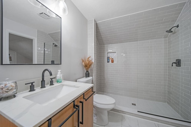 2348 Willowside Ln, Grove City, OH 43123 - bathroom with toilet, vanity, and a tile shower