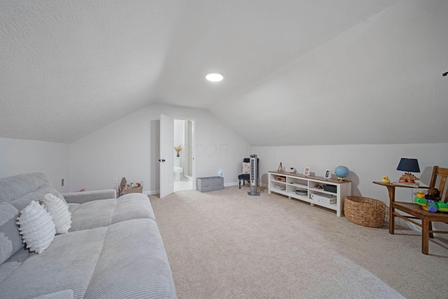 2348 Willowside Ln, Grove City, OH 43123 - carpeted bedroom with lofted ceiling, ensuite bath, and baseboards