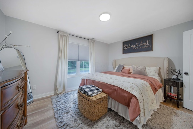 2348 Willowside Ln, Grove City, OH 43123 - bedroom with light wood-style floors and baseboards