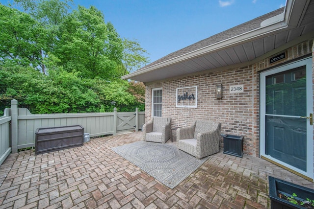 2348 Willowside Ln, Grove City, OH 43123 - fenced backyard featuring a patio area and a gate