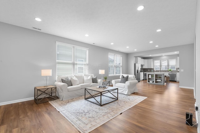 6051 Limewood Dr, Westerville, OH 43081 - living room with recessed lighting, baseboards, and dark wood-style floors