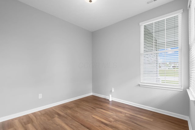 6051 Limewood Dr, Westerville, OH 43081 - unfurnished room with baseboards and dark wood-style flooring