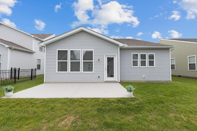 6051 Limewood Dr, Westerville, OH 43081 - back of property with a patio area and a shingled roof