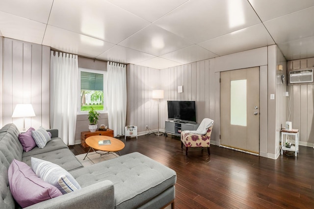 214 Arden Rd, Columbus, OH 43214 - living area featuring hardwood / wood-style floors, baseboards, and a wall unit AC