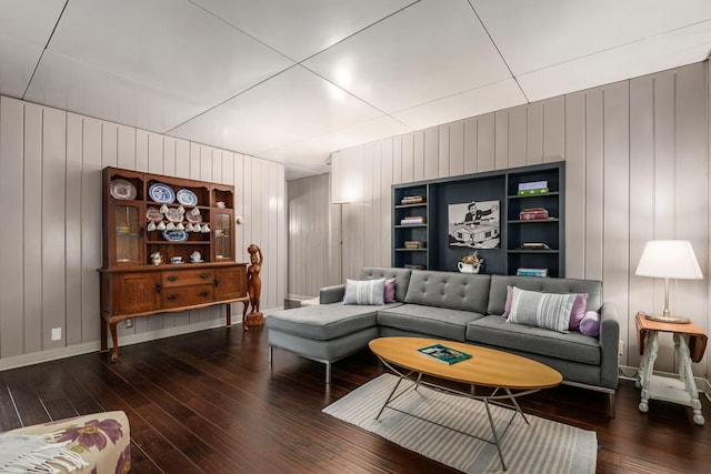214 Arden Rd, Columbus, OH 43214 - living room with hardwood / wood-style flooring, wood walls, and baseboards