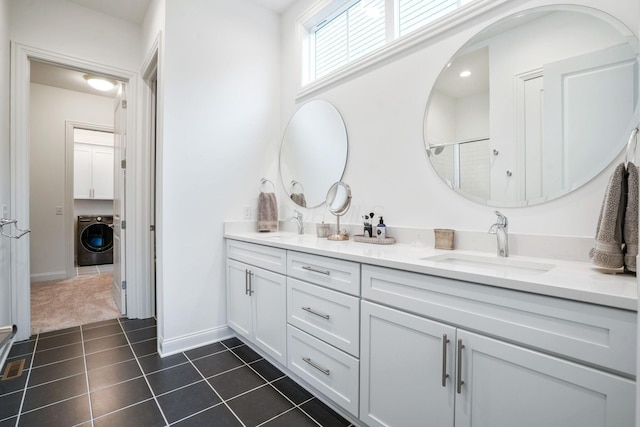 1526 Villa Way, Powell, OH 43065 - bathroom featuring double vanity, tile patterned flooring, baseboards, and a shower