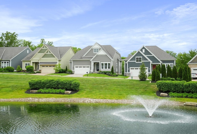 1526 Villa Way, Powell, OH 43065 - craftsman-style home featuring board and batten siding, a front yard, a water view, and driveway