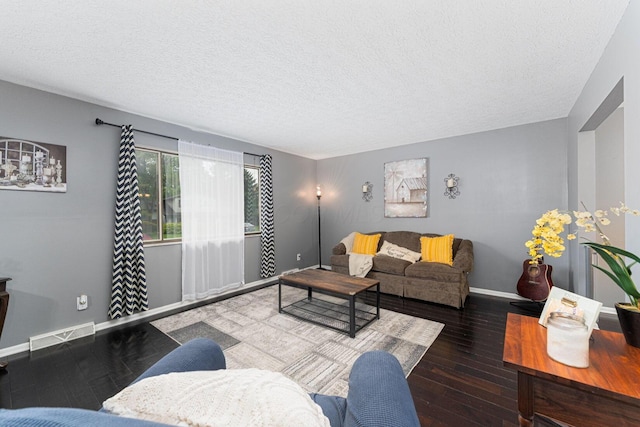 1392 Brenthaven Pl, Columbus, OH 43228 - living area featuring a textured ceiling, baseboards, and wood-type flooring