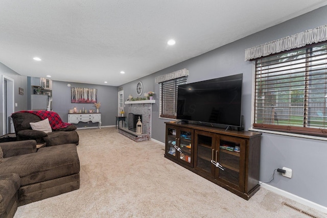 1392 Brenthaven Pl, Columbus, OH 43228 - carpeted living room with baseboards, recessed lighting, a fireplace, and a textured ceiling