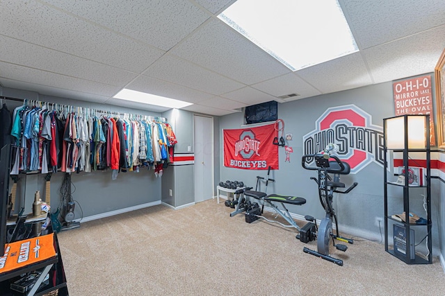 1392 Brenthaven Pl, Columbus, OH 43228 - workout area featuring carpet flooring, a drop ceiling, and baseboards