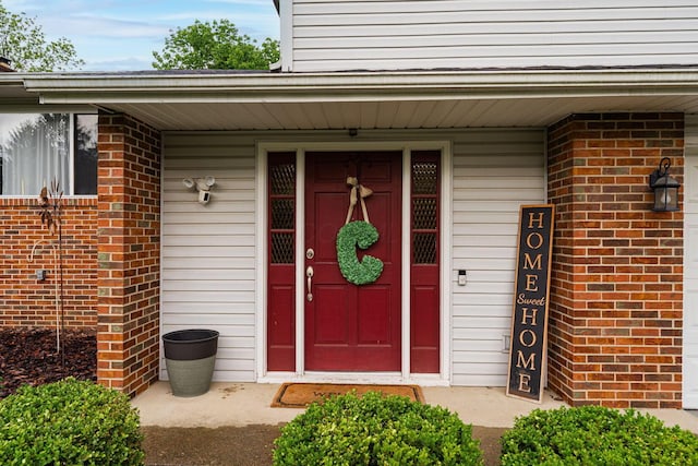 1392 Brenthaven Pl, Columbus, OH 43228 - entrance to property featuring brick siding and a porch