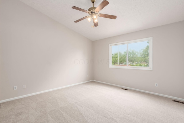 2353 Mccauley Ct Unit 6, Columbus, OH 43220 - spare room with light carpet, vaulted ceiling, baseboards, and a ceiling fan