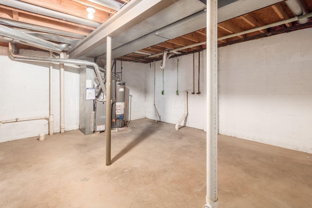 2353 Mccauley Ct Unit 6, Columbus, OH 43220 - unfinished below grade area featuring water heater, heating unit, and concrete block wall