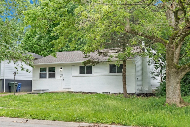 2809 Millvale St, Columbus, OH 43232 - view of front facade with brick siding, a shingled roof, and a front lawn
