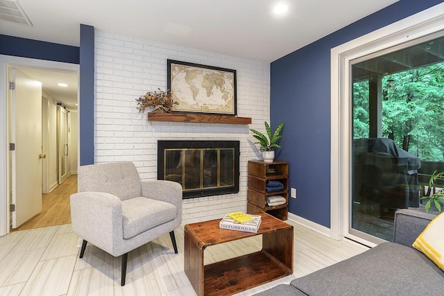 232 Hardy Way, Worthington, OH 43085 - living room with a brick fireplace, recessed lighting, and baseboards