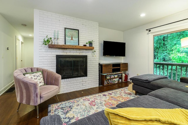 232 Hardy Way, Worthington, OH 43085 - living room with wood finished floors, a fireplace, recessed lighting, and baseboards