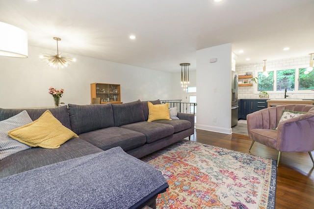 232 Hardy Way, Worthington, OH 43085 - living room featuring a chandelier, dark wood-type flooring, recessed lighting, and baseboards
