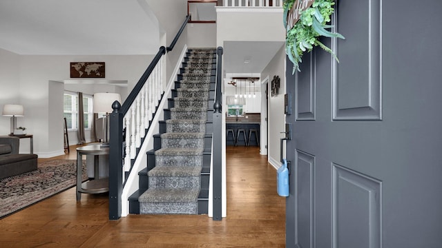 6101 Parkmeadow Ln, Hilliard, OH 43026 - foyer featuring stairway, wood finished floors, and baseboards