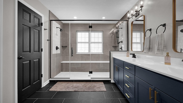 6101 Parkmeadow Ln, Hilliard, OH 43026 - full bathroom with a stall shower, double vanity, tile patterned flooring, and recessed lighting