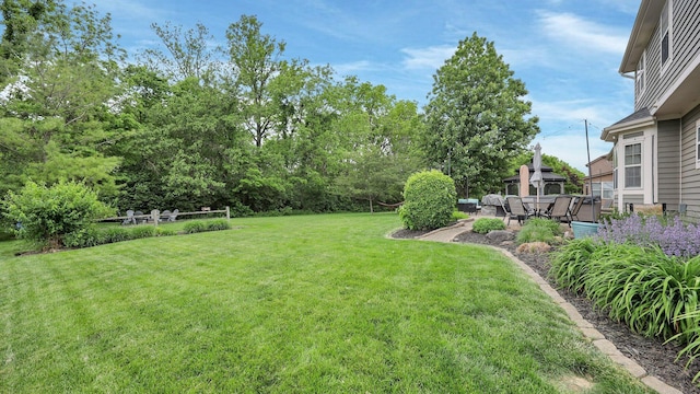 6101 Parkmeadow Ln, Hilliard, OH 43026 - view of green lawn featuring a gazebo and a patio