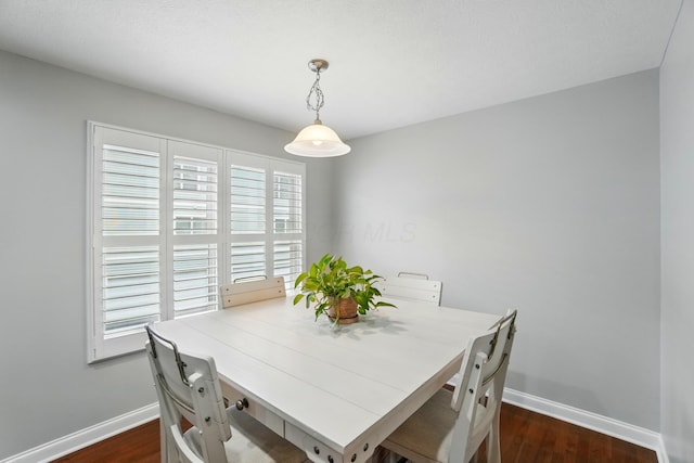 5932 Winberry Creek Dr Unit 1106, Dublin, OH 43016 - dining room with baseboards and dark wood finished floors
