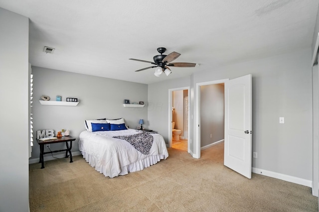 5932 Winberry Creek Dr Unit 1106, Dublin, OH 43016 - bedroom featuring carpet, baseboards, ensuite bath, and ceiling fan