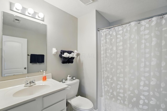 5932 Winberry Creek Dr Unit 1106, Dublin, OH 43016 - bathroom featuring toilet, vanity, and a textured ceiling