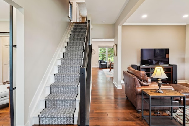2407 Bryton Dr, Powell, OH 43065 - stairs featuring hardwood / wood-style flooring, crown molding, baseboards, and recessed lighting