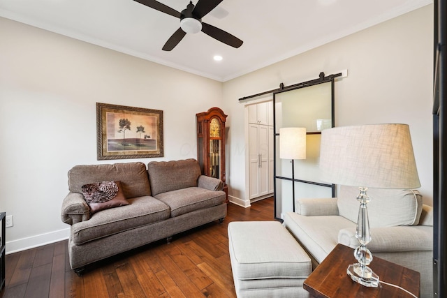 2407 Bryton Dr, Powell, OH 43065 - living room featuring a barn door, ceiling fan, baseboards, crown molding, and recessed lighting
