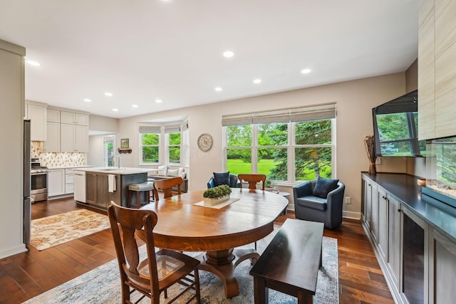 2407 Bryton Dr, Powell, OH 43065 - dining area featuring dark wood-type flooring, recessed lighting, and baseboards