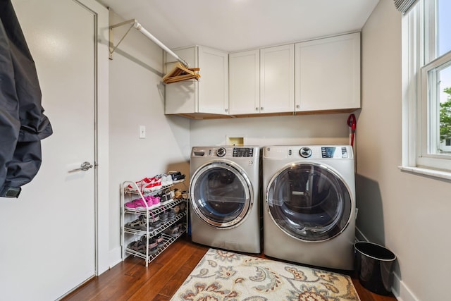 2407 Bryton Dr, Powell, OH 43065 - washroom featuring dark wood-type flooring, cabinet space, washer and dryer, and baseboards