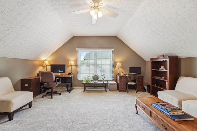 2407 Bryton Dr, Powell, OH 43065 - carpeted home office with a textured ceiling, ceiling fan, and vaulted ceiling