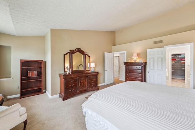 2407 Bryton Dr, Powell, OH 43065 - bedroom featuring lofted ceiling, baseboards, carpet floors, and a textured ceiling