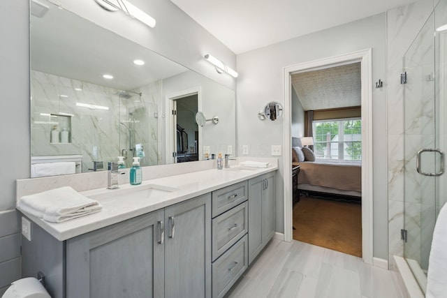 2407 Bryton Dr, Powell, OH 43065 - ensuite bathroom with a marble finish shower and double vanity