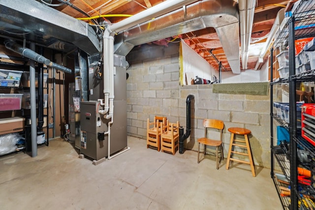 2407 Bryton Dr, Powell, OH 43065 - unfinished below grade area featuring heating unit and concrete block wall