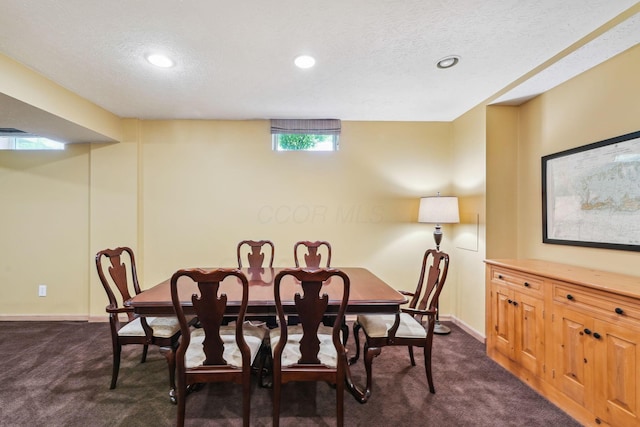 2407 Bryton Dr, Powell, OH 43065 - dining area featuring dark colored carpet, baseboards, recessed lighting, and a textured ceiling