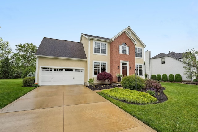 2407 Bryton Dr, Powell, OH 43065 - colonial house with concrete driveway, an attached garage, a front yard, and stucco siding