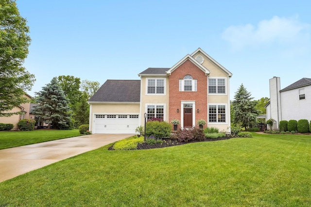 2407 Bryton Dr, Powell, OH 43065 - colonial inspired home with concrete driveway, an attached garage, and a front yard