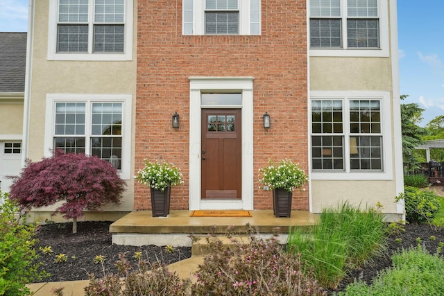 2407 Bryton Dr, Powell, OH 43065 - property entrance featuring stucco siding and brick siding
