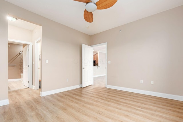 539 W 1st Ave Unit 308, Columbus, OH 43215 - unfurnished room featuring light wood-type flooring, ceiling fan, and baseboards