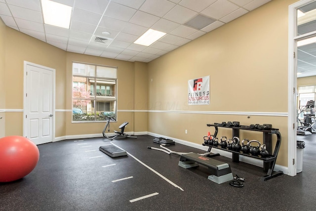539 W 1st Ave Unit 308, Columbus, OH 43215 - workout area featuring baseboards and a drop ceiling